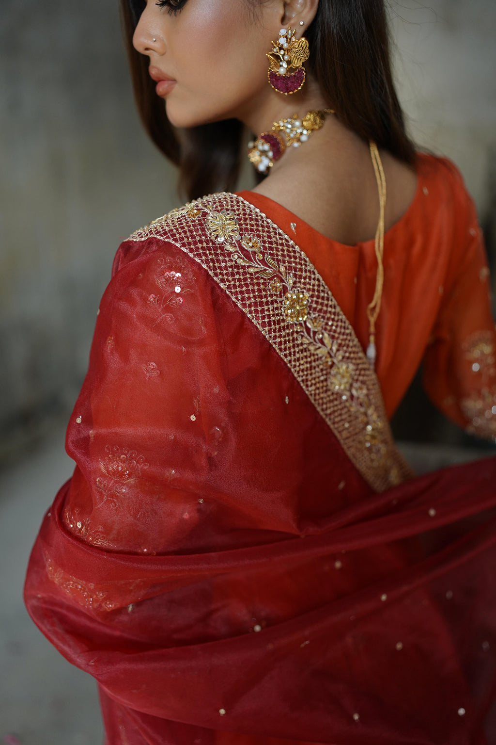 ZEBAISH E ZAMANA ( ORANGE/RED DRESS)