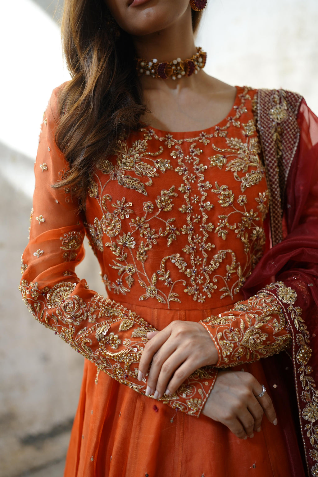 ZEBAISH E ZAMANA ( ORANGE/RED DRESS)